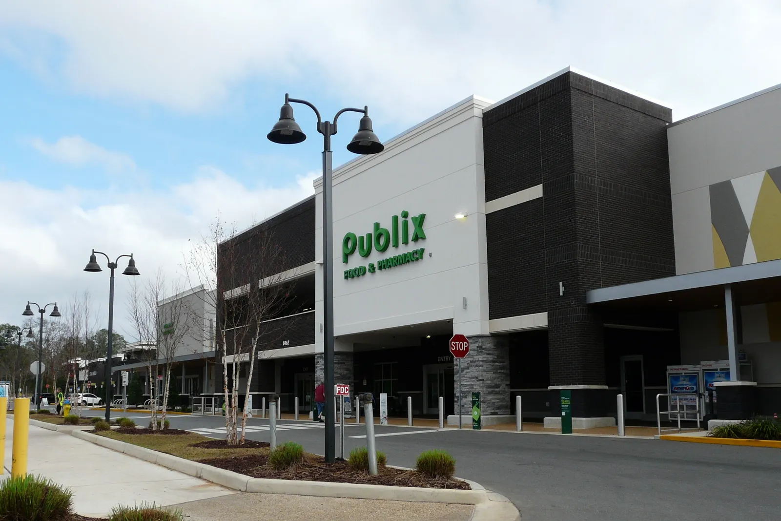 Modern grocery-anchored shopping center.